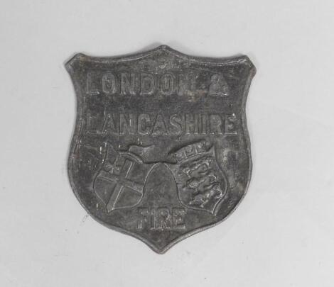 A reproduction London & Lancashire Fire lead shield shaped insurance plaque