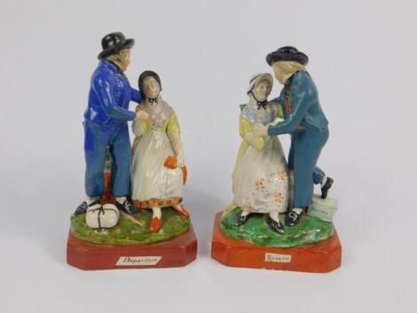 A pair of early 19thC Staffordshire pearl ware marine figures