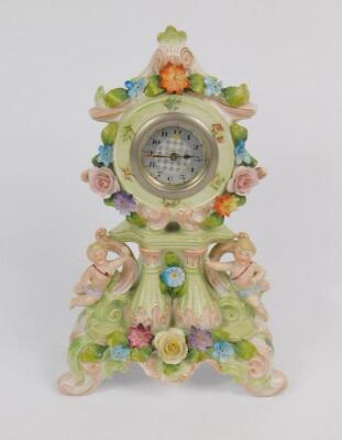 A Continental early 20thC porcelain mantel clock