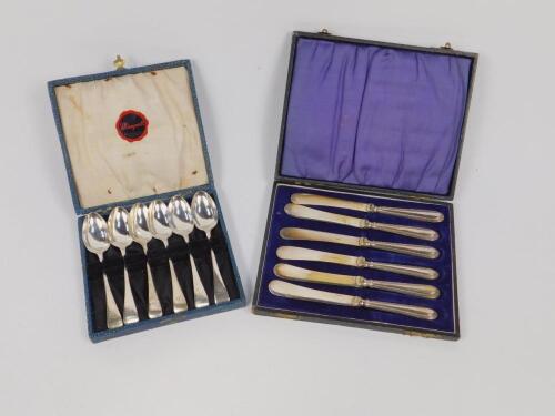 A set of six Edward VII silver grapefruit spoons