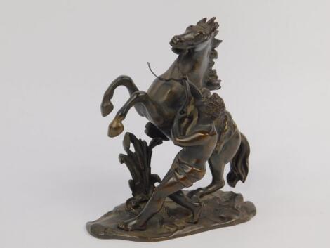 After Guillaume Coustou. A late 19thC bronze cast of a Marley Horse