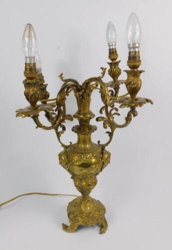 A Continental late 19thC ormolu four branch candelabrum