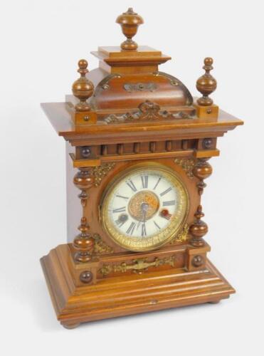 A Hamburg American Clock Co late 19thC walnut cased mantel clock