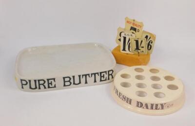 A Parnell & Sons Ltd white glazed pottery 'Pure Butter' advertising stand