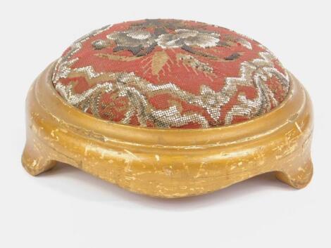 A Victorian giltwood foot stool