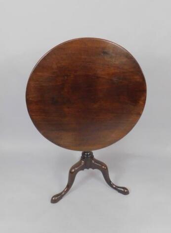 A George III mahogany tilt top occasional oval table