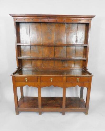 A Georgian oak and elm Welsh dresser