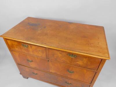 A walnut chest of drawers - 2