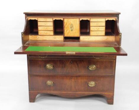 A George III figured mahogany secretaire chest