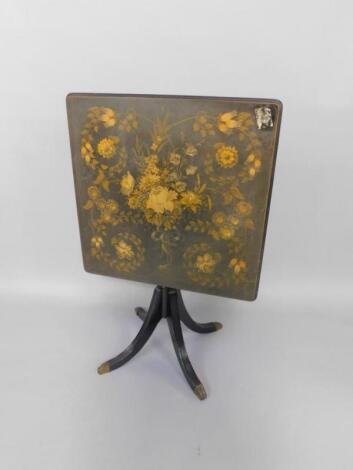 A Victorian square ebonised table