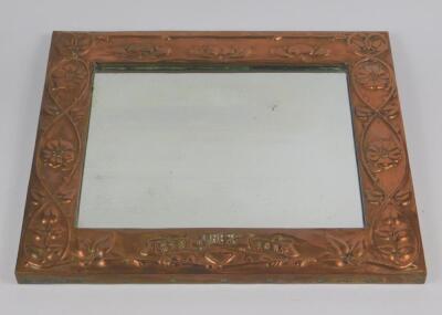 An Arts & Crafts copper framed rectangular wall mirror