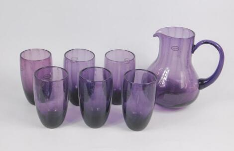A Portmeirion amethyst glass lemonade set decorated in the Beachcomber pattern