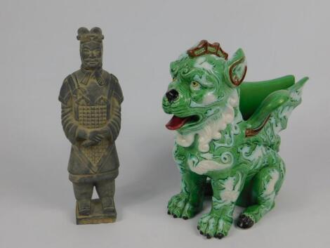 A Chinese Porcelain figural vase modelled as a winged lion