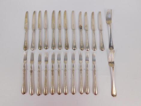 Twelve pairs of Edwardian silver dessert knives and forks