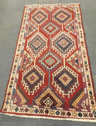 A Caucasian wool rug