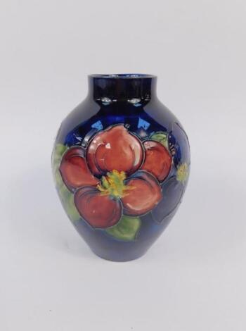 A Moorcroft pottery early 20thC ovoid vase decorated in the Anemone pattern