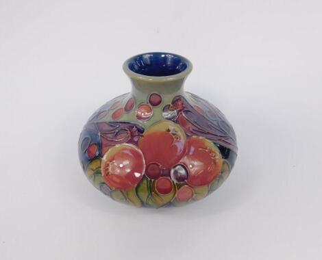 A Moorcroft pottery vase of bulbous and baluster form decorated in the Finches pattern