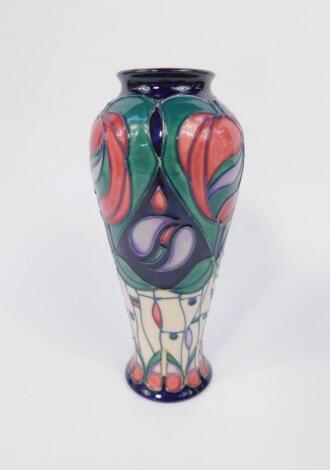 A Moorcroft pottery baluster vase decorated in the Mackintosh Tribute pattern