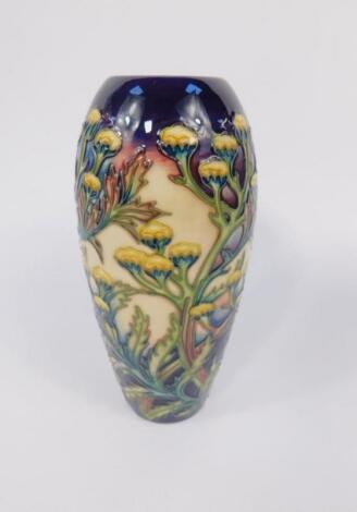 A Moorcroft pottery ovoid vase decorated in the Tansy pattern