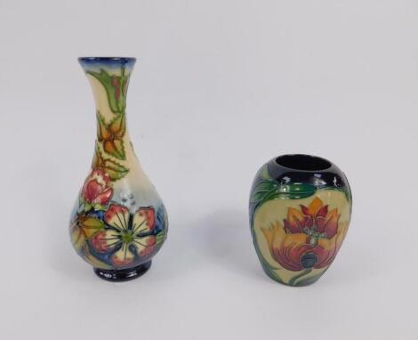 A Moorcroft pottery ovoid vase decorated in the Fireflower pattern