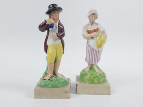 A near pair of early 19thC Staffordshire pearlware figures