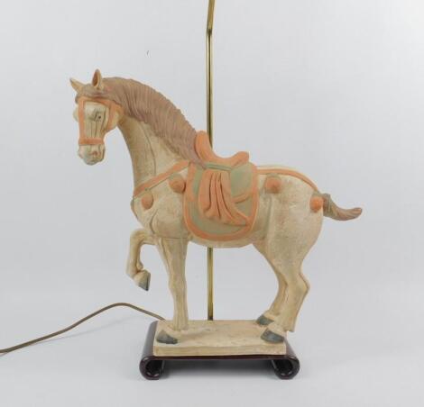 A modern Tang style earthenware figure of a standing horse