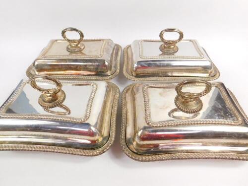 A set of four electroplate entree dishes