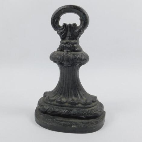 A Victorian cast iron door porter