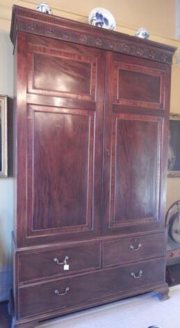 A George III mahogany press cupboard