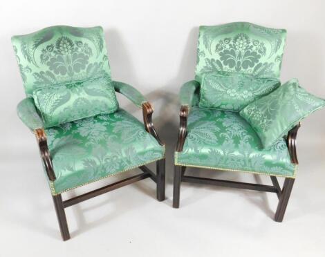 A pair of reproduction mahogany Gainsborough chairs