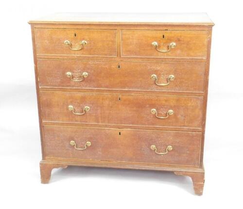 An early 19thC oak chest of drawers