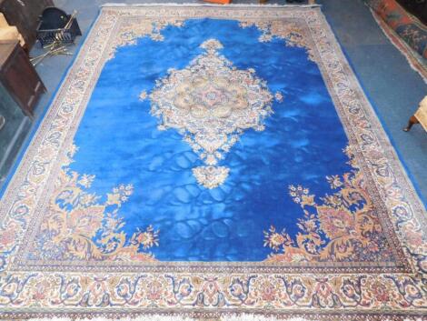 A late 20thC Kandahar Ldp Belgil machine made wool floral carpet square