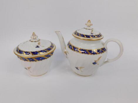 A Worcester First Period porcelain wrythen fluted teapot and sucrier