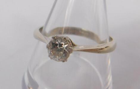 A diamond solitaire ring