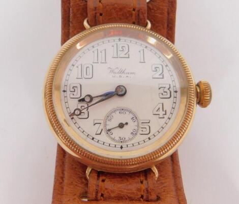 A Waltham gentleman's circular gold cased wristwatch