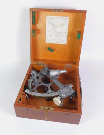 A Kelvin Hughes grey metal cased sextant