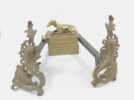 A pair of French late 19thC brass rococo style chenet