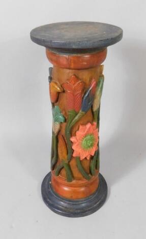 A painted and carved wooden jardiniere stand