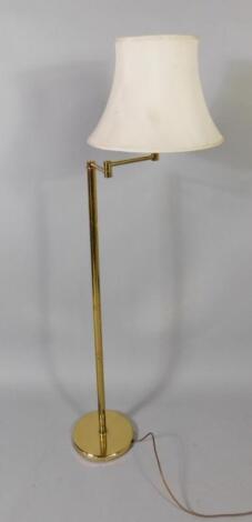 A brass angular stand and lamp