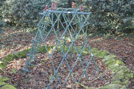 A 19thC cast iron farm harrow.