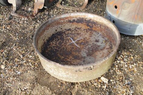 A cast iron circular trough.