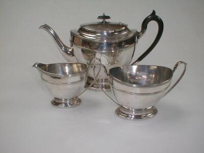 An Adam style urnular tea service of teapot