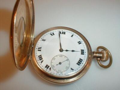 A gold plated half hunter pocket watch