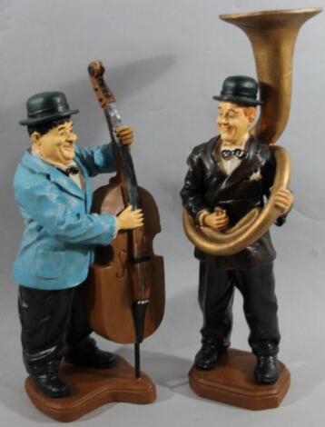 Two modern resin figures of Laurel and Hardy