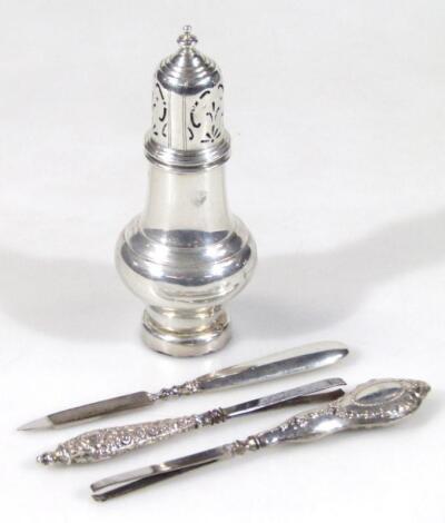 A George V silver sugar sifter with pierced domed top