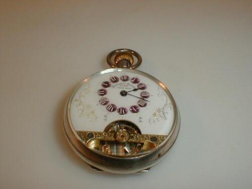 A silver cased French open faced pocket watch