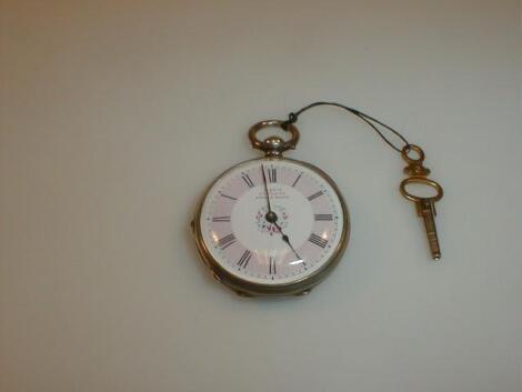 A silver cased ladies fob watch with pink