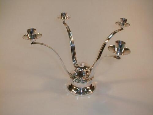 A silver four branch candelabrum of contemporary design