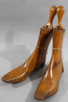 A pair of early 20thC wooden ladies boot lasts
