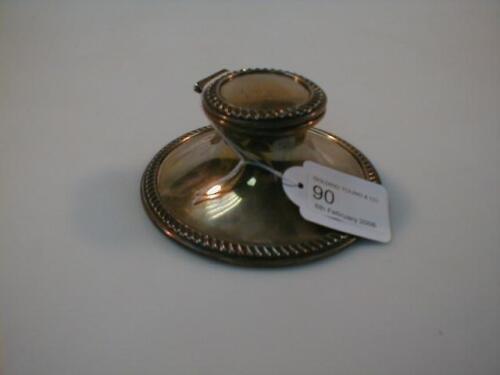 An Edward VII silver capstan ink well